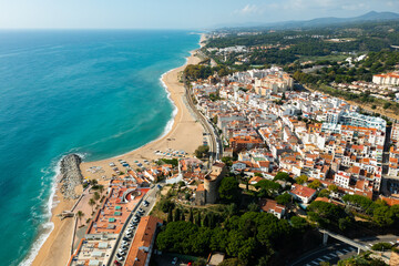 Fototapeta premium Townscape of Sant Pol de Mar, Maresme region, Catalonia, Spain. View of sea coast and beach.