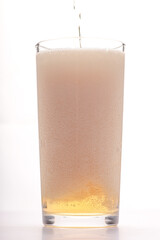 glass with beer and lots of foam