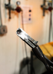 borax powdered on iron before a blacksmith heats it