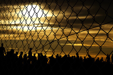 Migration und Zaun an der Grenze