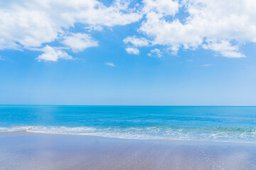 Small wave by the ocean in Florida in the spring. Turquoise ocean and perfect fine sand Melbourne Beach