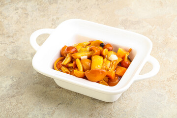 Marinated pickled honey mushrooms in the bowl
