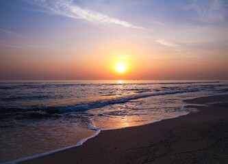 Fototapeta na wymiar sunset on the beach, Stunning evening, Sunset, Sunset landscape, Evening on the beach.