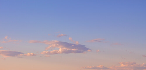 Beautiful clouds in the twilight on clear sky. Banner