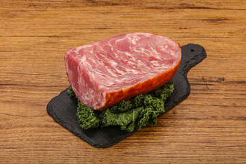 Beef ham piece over board
