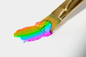 Rainbow brush stroke on white background