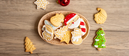 Merry Christmas with homemade cookies on wood table background. Xmas, party, holiday and happy New Year concept