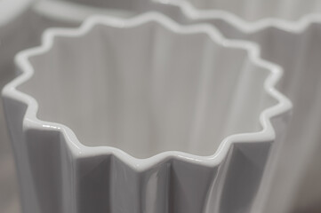 Fototapeta premium Abstract star made of white ceramic on defocused background