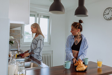 Two females making breakfast