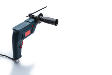 Professional tool electric drill isolated on white background. Electric hand tools.