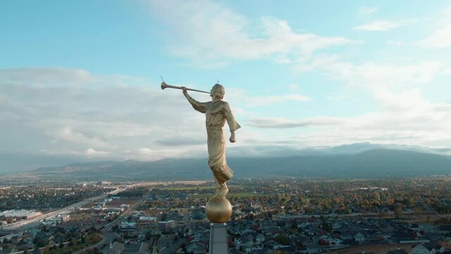 AWESOME AERIAL PEDESTAL SHOT OF ANGEL MORONI FROM LDS MORMON OQUIRRH MOUNTAIN TEMPLE AT SOUTH JORDAN UTAH