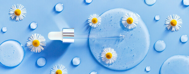 banner serum dropper on a blue background with chamomile flowers transparent gel	

