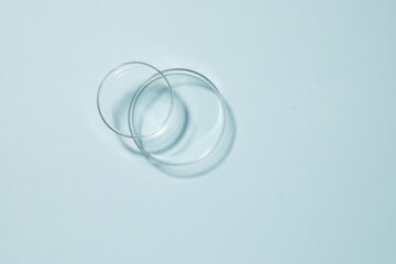 petri dishes on blue background 