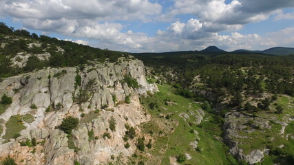 Fototapeta na wymiar Historical ancient Phrygian (Phrygian Valley, Gordion) Valley. Spectacular natural beauty and monuments, structures, houses carved into the rocks. Aerial view, Kütahya Province – TURKEY