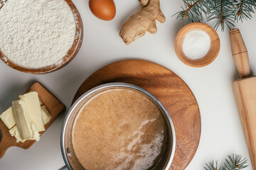 Step-by-step tutorial on baking Christmas gingerbread cookies. Step 3: Stirring wait until sugar is...
