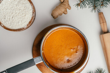 Step-by-step tutorial on baking Christmas gingerbread cookies. Step 7: Stir until smooth, top view