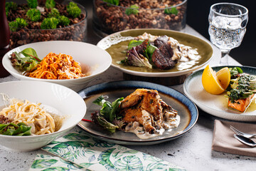 Set of different gourmet mediterranean dishes on the table