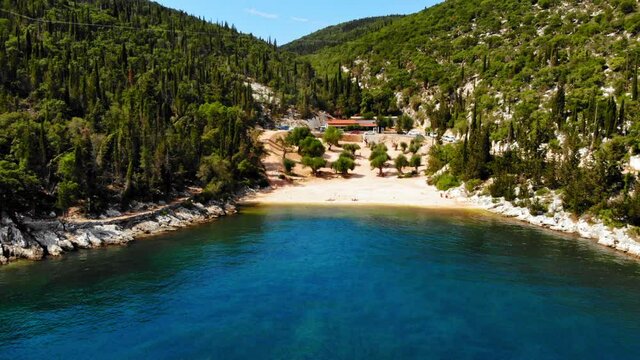 Marvelous Natural Beauty Of The Sea And Mountains In Foki Beach in The Ionian Island In Greece - aerial shot