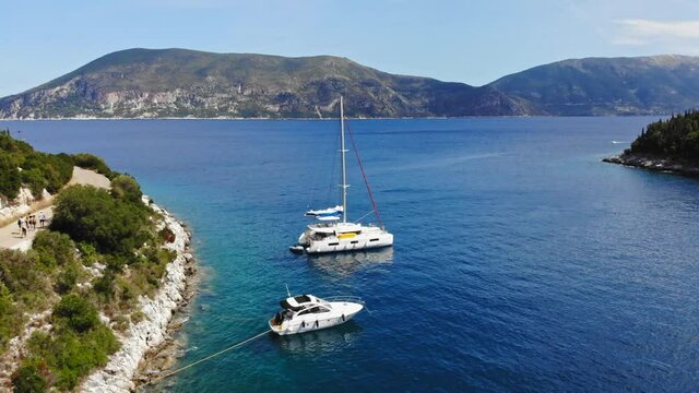 Luxury Boats At Foki Beach In The Ionian Island Of Kefalonia, Greece. aerial