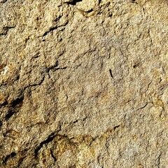 An old stone blur with beautiful streaks, colored in brown, yellow, blue, white and black as wallpaper themes.