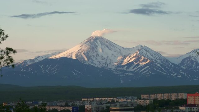 Avachinsky volcano in the snow at sunset. Petropavlovsk-Kamchatsky. Kamchatka
