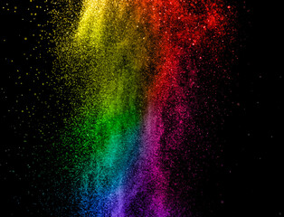 Color powder splash explosion on black background. Abstract multicolor tint rainbow design. Vibrant cloud dust creative art.