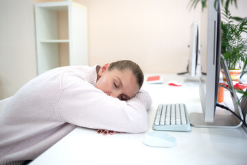young woman is sad at the workplace. office work concep
