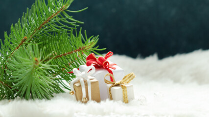 Christmas decorations on a winter snowcovered background. Xmas or New Year greeting card.