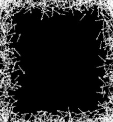 A frame of a frosty pattern of ice crystals on a black background. A frame with an abstract ice structure allows you to apply or add a frost effect. Frost on the glass, freezing effect