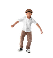 Cute dancing African-American boy on white background