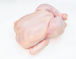 Halal chicken prepared for roasting on a spit. Isolated on white background.