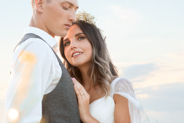 Happy wedding couple on summer day