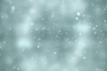 blurred snow / winter abstract background, snowflakes on abstract blurred glowing leaf background