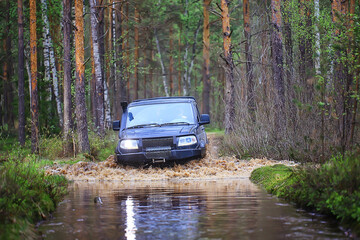 Fototapeta na wymiar SUV forest ford across the river extreme road tourism 4 on 4