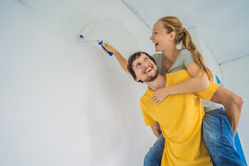 renovation diy paint couple in new home painting wall