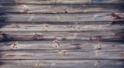 Braune Latten-Holzwand mit Strukturen als Hintergrund