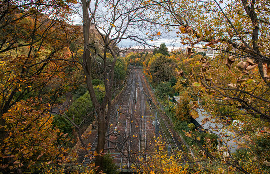 Waverley Edinburgh Train historical rail station during an autumn cloudy morning. Landmarks of Scotland, United Kingdom. Transportation industry, travel by trains.