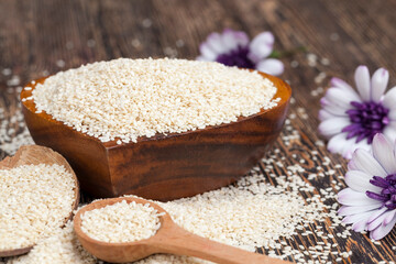white sesame seeds on a wooden table