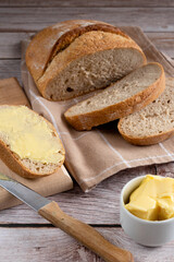 Healthy and delicious whole grain bread with butter.