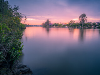 Riverside Sunrise with Reflections