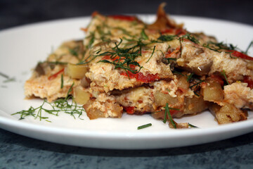 Frittata made from potatoes, peppers, tomatoes and eggplants. A hearty breakfast.