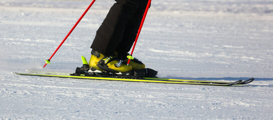 A man is skiing in the snow