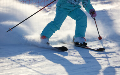 A man is skiing in the snow