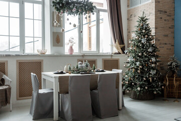 Modern design Christmas tree decorated with balls, toys and garlands. Christmas or New Year background. Winter holidays composition.