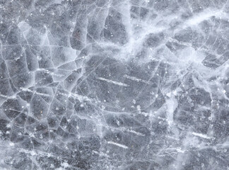 Crushed ice in a puddle as an abstract background.