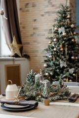 Modern design Christmas tree decorated with balls, toys and garlands. Christmas or New Year background. Winter holidays composition.