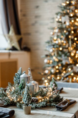 Modern design Christmas tree decorated with balls, toys and garlands. Christmas or New Year background. Winter holidays composition.