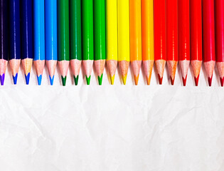 close up of color pencils on white background, copyspace