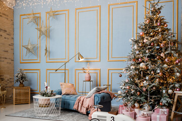 Modern design Christmas tree decorated with balls, toys and garlands. Christmas or New Year background. Winter holidays composition.