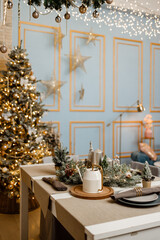 Modern design Christmas tree decorated with balls, toys and garlands. Christmas or New Year background. Winter holidays composition.